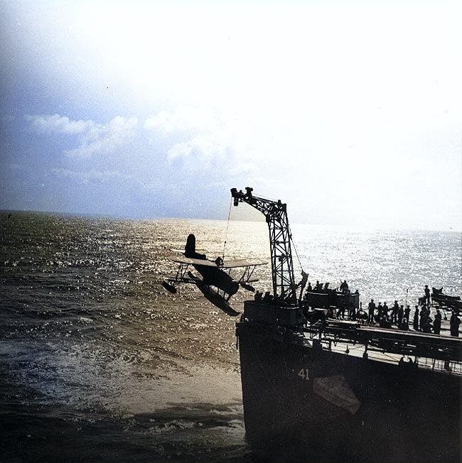 SOC Seagull aircraft being recovered by cruiser Philadelphia, off North Africa, Nov 1942, photo 2 of 4 [Colorized by WW2DB]