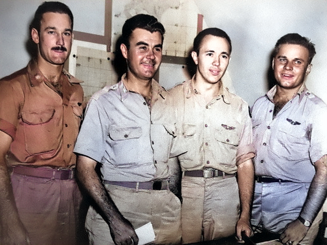 Crew of 'Enola Gay' over Hiroshima, Japan: Maj. Thomas W. Ferebee, bombardier; Col. Paul W. Tibbets, Jr. pilot; Capt. Theodore J. Van Kirk, navigator; Capt. Robert Lewis, officer crew; 5 Aug 1945 [Colorized by WW2DB]