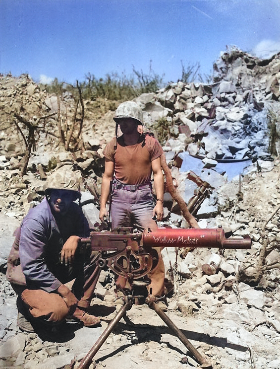 A .30 caliber Browning water-cooled machine gun and its crew on Iwo Jima, circa Feb-Mar 1945 [Colorized by WW2DB]
