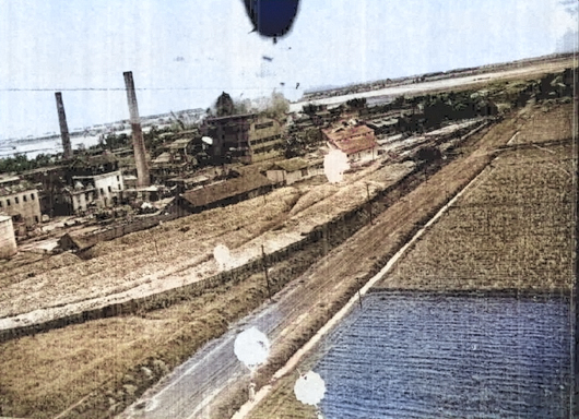 Sugar refinery at Suantau, Kagi (now Suantou, Chiayi), Taiwan under parafrag attack by two USAAF B-25J bombers, 2 Jun 1945, photo 2 of 3 [Colorized by WW2DB]