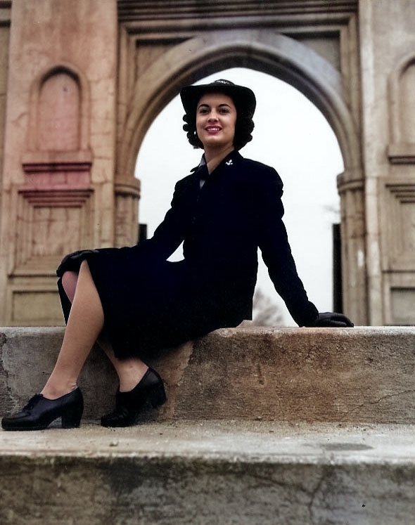 WAVES Yeoman 3rd Class Ellen Figg posing by the entrance to the Old Capitol Grounds, Milledgeville, Georgia, United States, circa Sep 1944 [Colorized by WW2DB]