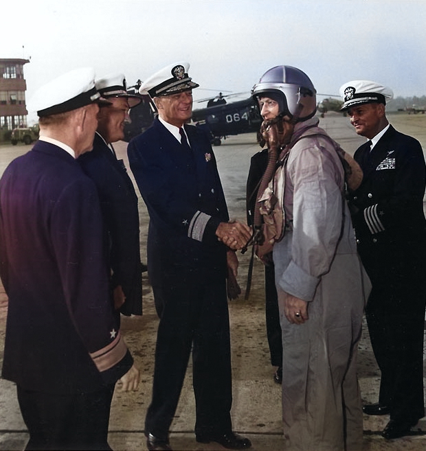 Burke, in flight suit, arrived at Naval Air Station Glenview, Illinois, US aboard an A3D jet bomber, 15 Sep 1955; meeting him were VAdm Doyle, RAdm Gallery, RAdm Forrestel, and Capt Hollingsworth [Colorized by WW2DB]