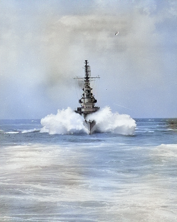 USS Miami prowing through a wave during her shakedown cruise, 17 Feb 1944; photo taken from USS Quincy [Colorized by WW2DB]