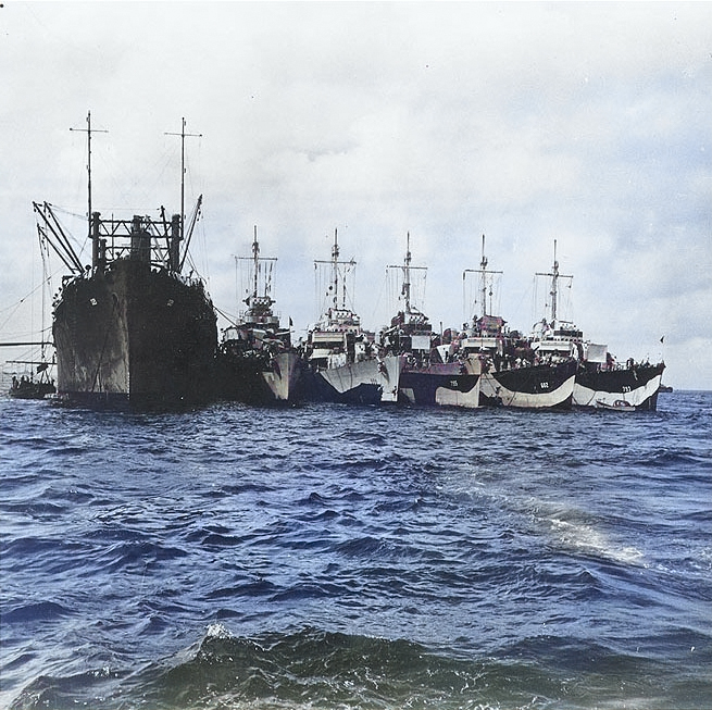 Destroyer tender Markab with destroyers Longshaw, Preston, Porterfield, and Cassin Young, circa early 1945 [Colorized by WW2DB]