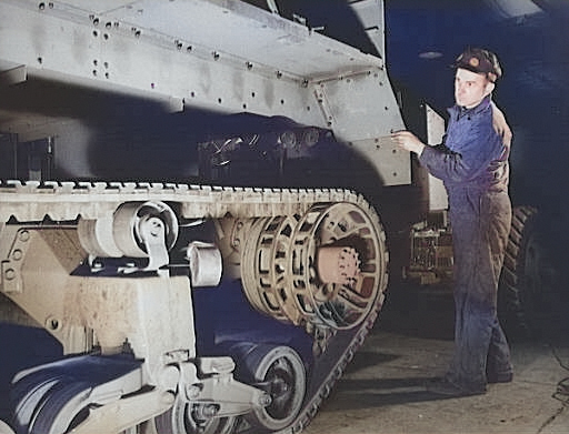 M2 Half-track vehicles under construction, Diebold Safe and Lock Company factory, Canton, Ohio, United States, Dec 1941, photo 1 of 4 [Colorized by WW2DB]