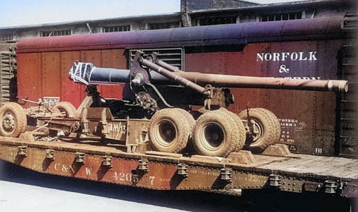 155mm Gun M1 arriving by rail at Hampton Roads Port of Embarkation, Newport News, Virginia, United States, 6 Aug 1943 [Colorized by WW2DB]