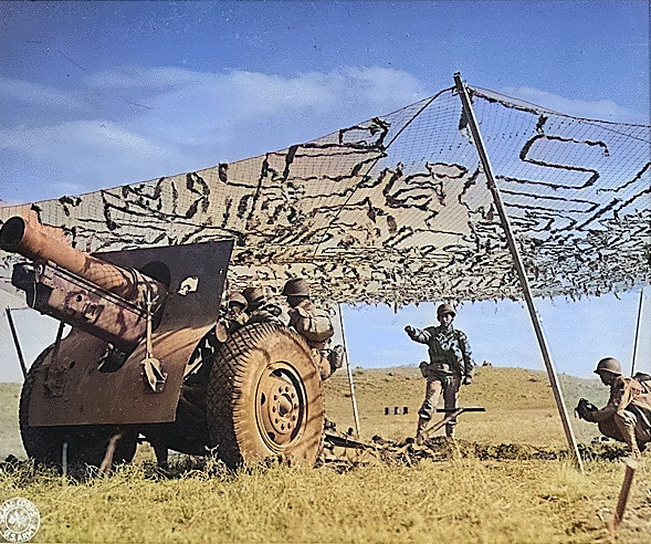 155 mm Howitzer Carriage M1917 or M1918 howitzer and crew in exercise, Camp Carson, Colorado, United States, 24 Apr 1943, photo 1 of 2 [Colorized by WW2DB]