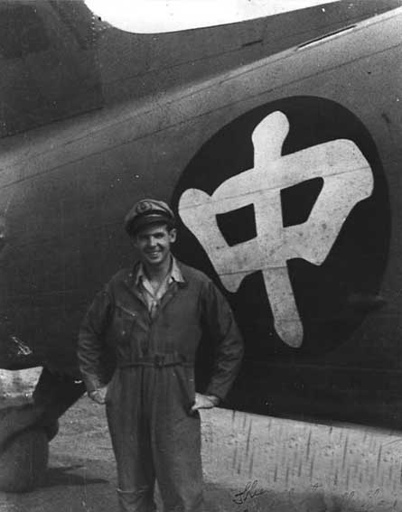USAAF pilot James M. Dalby in front of a C-47 Skytrain aircraft belonging to the China National Aviation Corporation, Kunming, Yunnan Province, China, Apr 1944