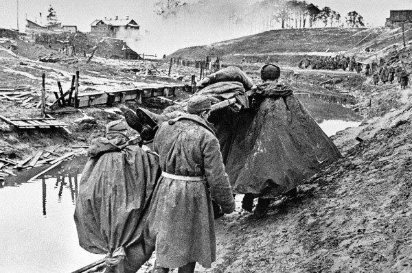 Soviet soldiers carrying a wounded comrade at Neva Dubrovka, near Leningrad, Russia, date unknown