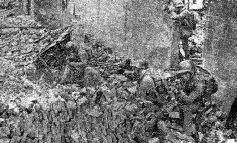 Chinese soldiers taking position in a bombed-out building, Shanghai, China, Oct 1937