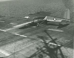 US Navy TDN-1 drone test from the decks of the training carrier USS Sable while steaming in reverse in Grand Traverse Bay, Michigan, United States, 10 Aug 1943. This particular test was unsuccessful. Photo 2 of 4.