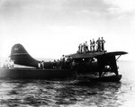 PBY-5 Catalina of US Navy Patrol Squadron VP-52 sits in Woendi Lagoon, Dutch New Guinea, 1944-45. As this photograph was taken, this airplane was in the process of slowly sinking, which it did a short time later.