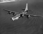 PB4Y-2 Privateer (derived from the PB4Y-1 Liberator) in flight off the eastern shore of Oahu, Hawaii, 1945. Photo 2 of 3.