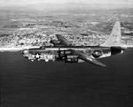 PB4Y-2 Privateer (derived from the PB4Y-1 Liberator) in flight off the eastern shore of Oahu, Hawaii, 1945. Photo 3 of 3.