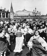 Victory celebration at the Bolshoy Kamenny Bridge near the Kremlin (background), Moscow, Russia, May 1945
