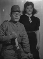 Portrait of a Japanese soldier with a Jewish refugee in Shanghai, China, date unknown