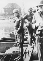 George Patton preparing to urinate in the Rhine River, Germany, 24 Mar 1945