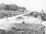 NE-1 aircraft taking off from a road with a wounded US Marine on board, Okinawa, Japan, 1945