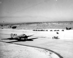 One C-47 Skytrain tow plane on the taxiway at a glider training airstrip in Texas and one CG-4A glider on the ramp, 1943.
