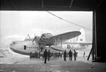 A war weary Sunderland III flying boat of Royal Australian Air Force No. 10 Squadron being hauled out of the water for an overhaul at Mount Batten Seaplane Base, Devon, England, United Kingdom, Jan 1943