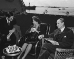 John Winant, Anna Boettiger (née Roosevelt), and Harry Hopkins aboard USS Quincy, Great Bitter Lake, Egypt, 14 Feb 1945