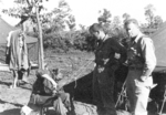 Clyde Covault, Jack Hedden, and Bob Compton of US 5332nd Brigade (Provisional), Camp Landis, Kachin, northern Burma, Dec 1944