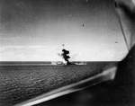 Japanese cruiser Kumano bombed by carrier planes in the Sibuyan Sea, Philippines, 26 Oct 1944. She lost her bow the previous day from a torpedo fired by USS Johnston in the opening shot of the Battle off Samar.
