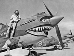 Curtis Tomahawk IIA fighter named “Menace” with Flying Officer Neville Bowker of RAF 112 Squadron in North Africa, mid-1941.