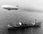 United States Navy K-class airship K-28 of Blimp Squadron 14 during escort duty above the armed tanker SS Paulsboro about 80 miles off the mouth of Chesapeake Bay, Virginia, United States, 27 Jan 1944.