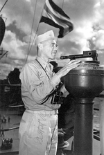 United States Navy Rear Admiral DeWitt Ramsey aboard USS Saratoga, Mar 1943. Note autograph.