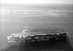 Escort Carrier USS Card in the North Atlantic photographed 10 Aug 1943 amid the large oil slick left by German submarine U-664, sunk by Card aircraft the day before.