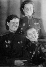 Officers of 46th Taman Guards Night Bomber Aviation Regiment, 325th Night Bomber Division, Soviet 4th Air Army Yevdokia Bershanskaya (left), Maria Smirnova (standing), and Polina Gelman, 1944