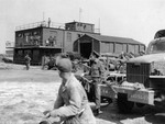 The control tower at RAF Thurleigh, Bedfordshire, England, United Kingdom, 1944-45. Note the firehouse next to it.