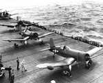 F4U-2 Corsair night fighters with Night Fighting Squadron VF(N)-101 lining up for an exercise flight aboard USS Intrepid as the ship sailed south from Hawaii toward the Marshall Islands, Jan-Feb 1944. Photo 2 of 2.