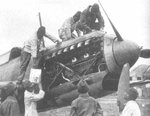 Mechanics working on a Ki-32 light bomber, circa 1930s