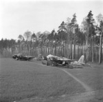 Me 410 aircraft at rest at an airfield, late 1945, photo 2 of 2