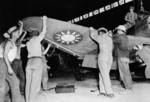 Ground crew assembling a P-43A-1 Lancer  fighter of the Republic of China Air Force, circa 1943