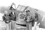 American airmen with a P-40E Kittyhawk fighter, China, 1940s; photo taken by personnel of 7th Photographic Technical Squadron, 8th Photographic Reconnaissance Group, USAAF