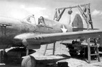 P-40E Kittyhawk fighter under maintenance, China, circa 1940