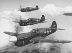 USAAF P-40 Warhawk fighters in flight, circa 28 Jun-14 Sep 1943