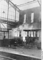 Burning railway car at the rail station in Calais, France, 4 Jun 1940