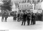 Suspected resistance fighters being rounded up in a city in France, Jul 1944