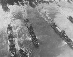US Navy LCI(L) ships unloading men at Morotai, 15 Sep 1944