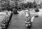 American transports unloading supplies at the beaches of Hollandia, New Guinea, circa Apr-May 1944