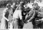 German women living in Poland giving bread to German soldiers, Poland, 2 Sep 1939