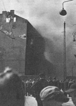 Burning building at the northern side of the Warsaw Ghetto, probably near the intersection of present day Franciszkanska and Bonifraterska streets, Warsaw, Poland, Apr-May 1943