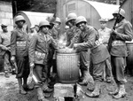 African-American soldiers of the US Army drawing rations, Northern Ireland, United Kingdom, Aug 1942