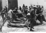 Civilians identifying victims of the Soviets, Tarnopol, Poland (now Ternopil, Ukraine), 10 Jul 1941