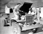 African-American US Army WAACs Ruth Wade and Lucille Mayo servicing a truck, Fort Huachuca, Arizona, United States, 8 Dec 1942