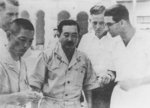 Tatsunosuke Ariizumi with German Navy submarine officers, Penang, Straits Settlements, 1940s
